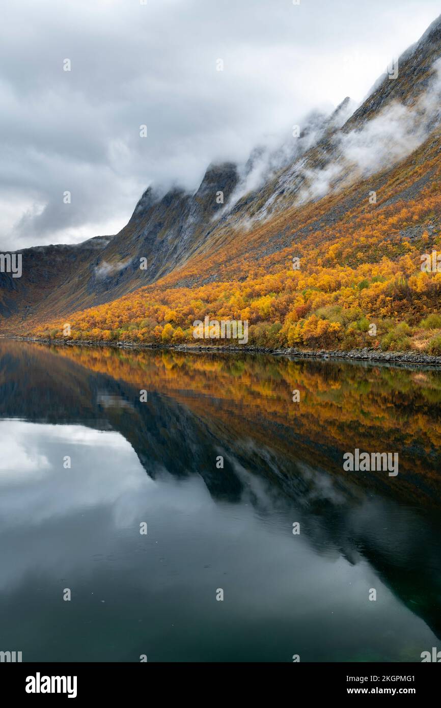 Tranquil scene of mountains by lake Stock Photo
