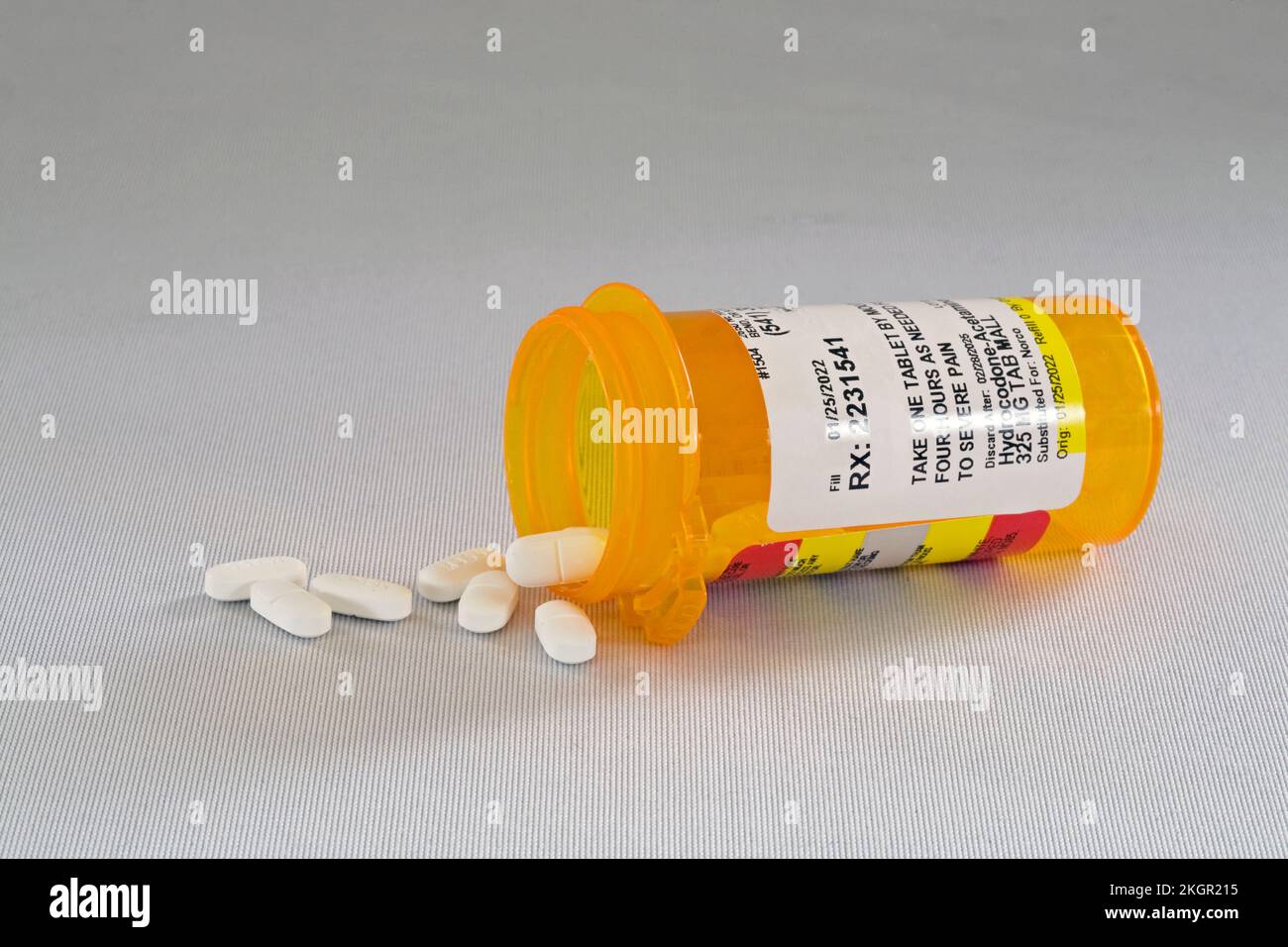 A container of hydrocodine, the addicting opioid pain killer prescribed by many doctors. Many people have become addicted and many others have died fr Stock Photo