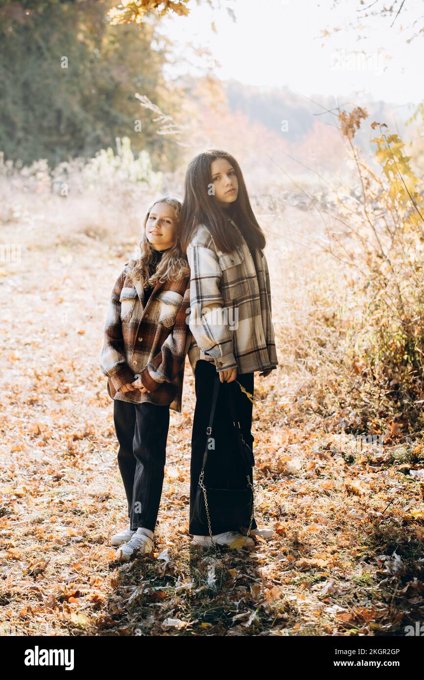 Girl in light jacket standing hi-res stock photography and images - Alamy