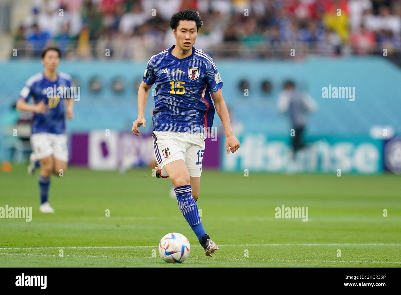 Doha, Qatar. 23rd Nov, 2022. DOHA, QATAR - NOVEMBER 23: Player of Japan Daichi Kamada drives the ball during the FIFA World Cup Qatar 2022 group E match between Germany and Japan at Khalifa International Stadium on November 23, 2022 in Doha, Qatar. (Photo by Florencia Tan Jun/PxImages) Credit: Px Images/Alamy Live News Stock Photo