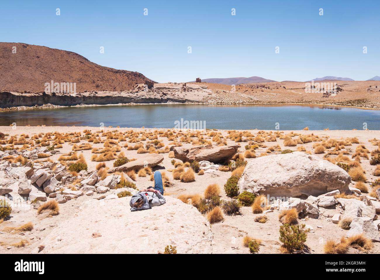 Tourist relaxing near the Laguna Negra (Black Lagoon or Lake) in Nor