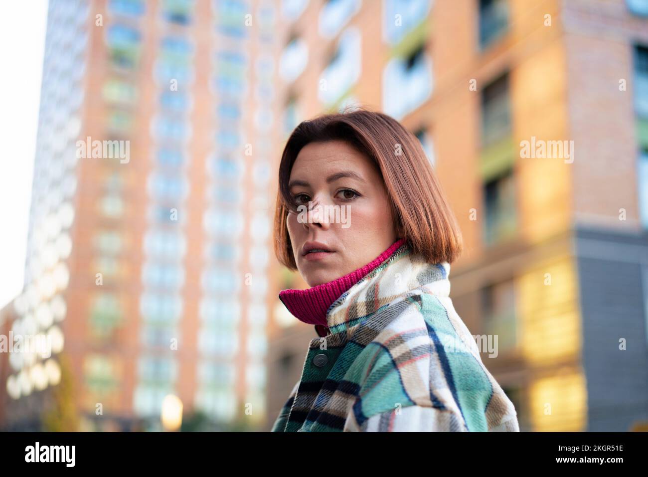 Serious young woman wearing hi-res stock photography and images - Alamy