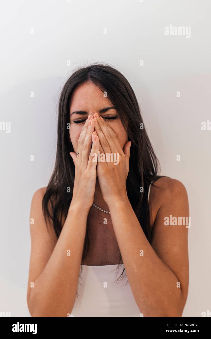 Sad woman hands touching face hi-res stock photography and images - Alamy