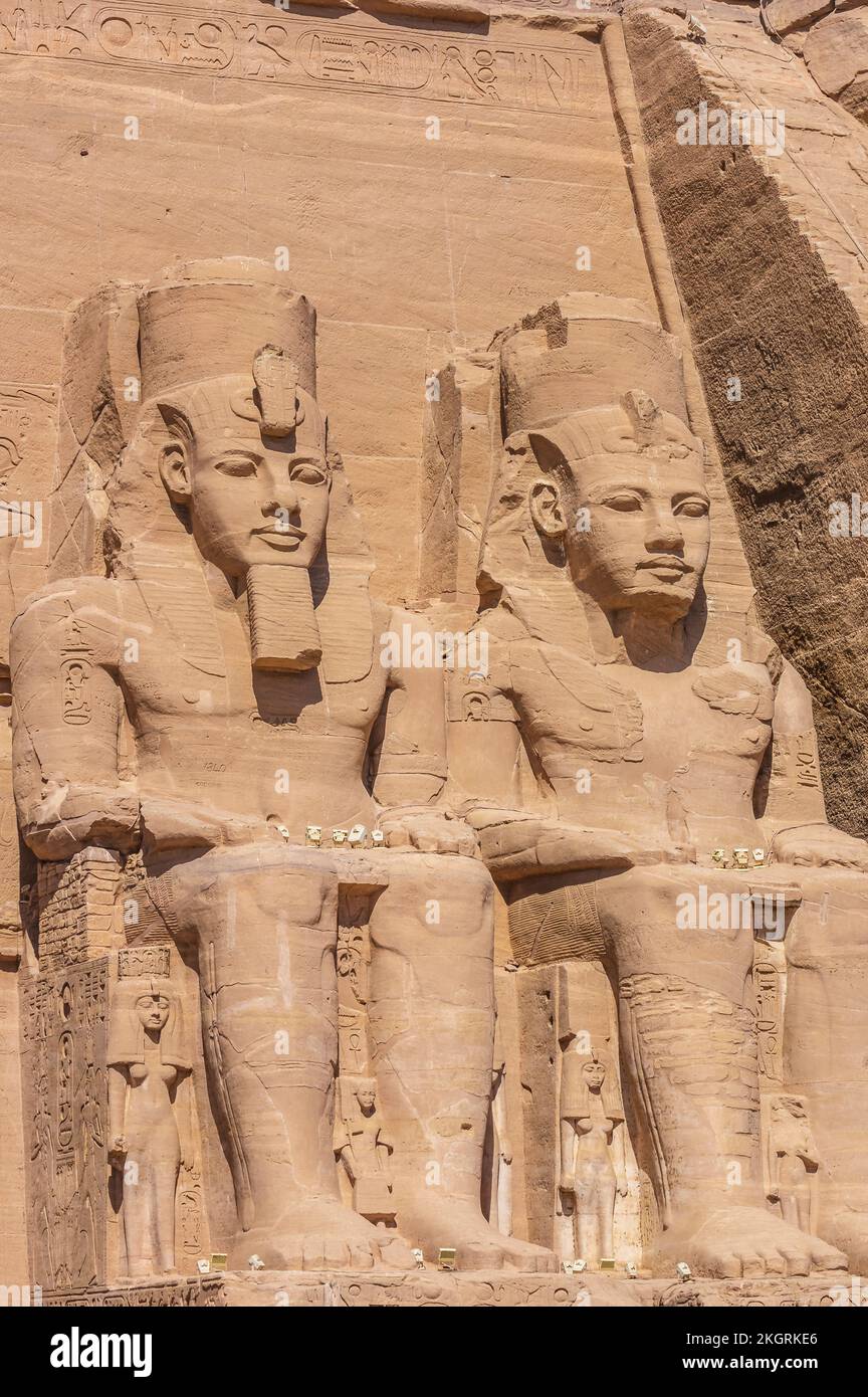 Egypt, Aswan Governorate, Giant statues at entrance of Great Temple of