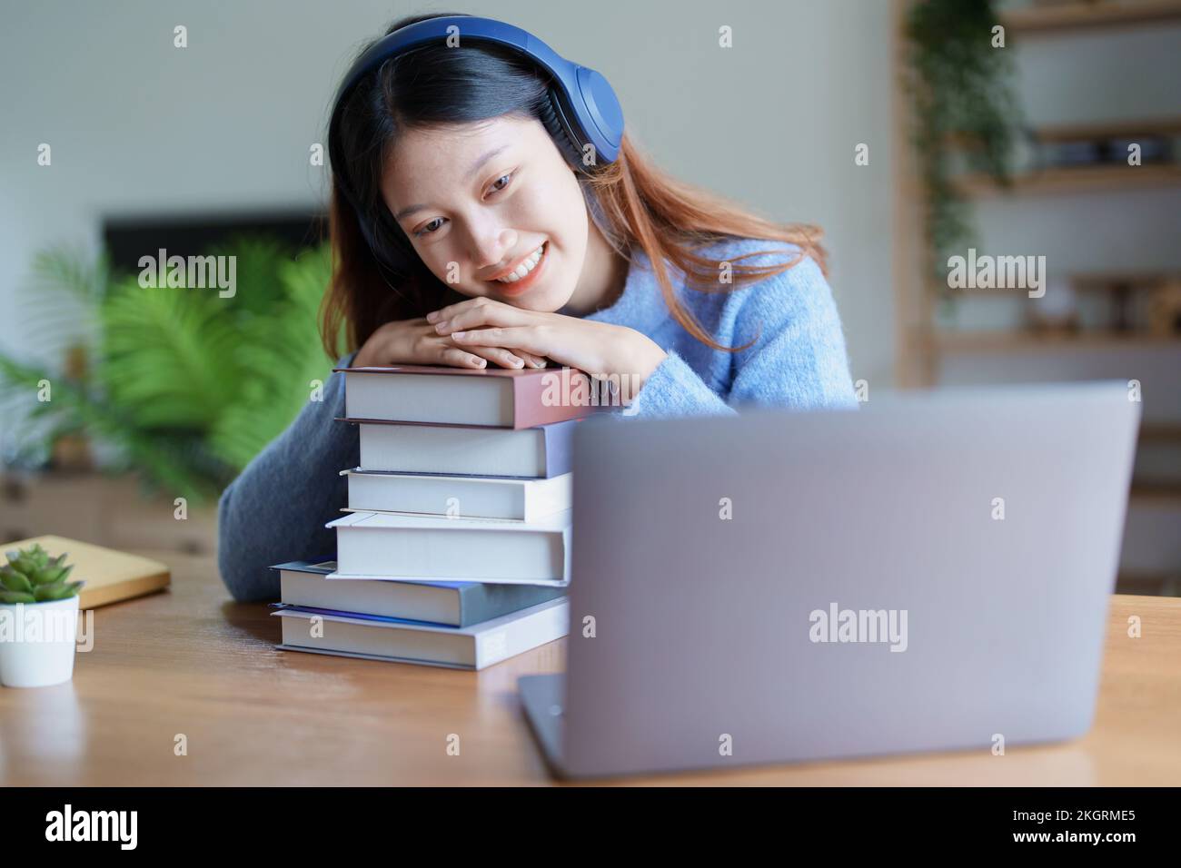 Portrait of young beautiful Asian woman showing smiling face during ...