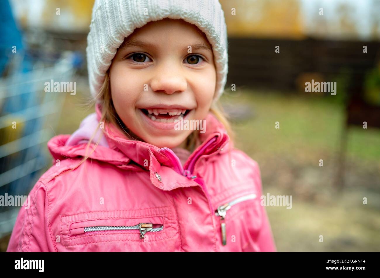 Happy girl wearing warm clothing Stock Photo
