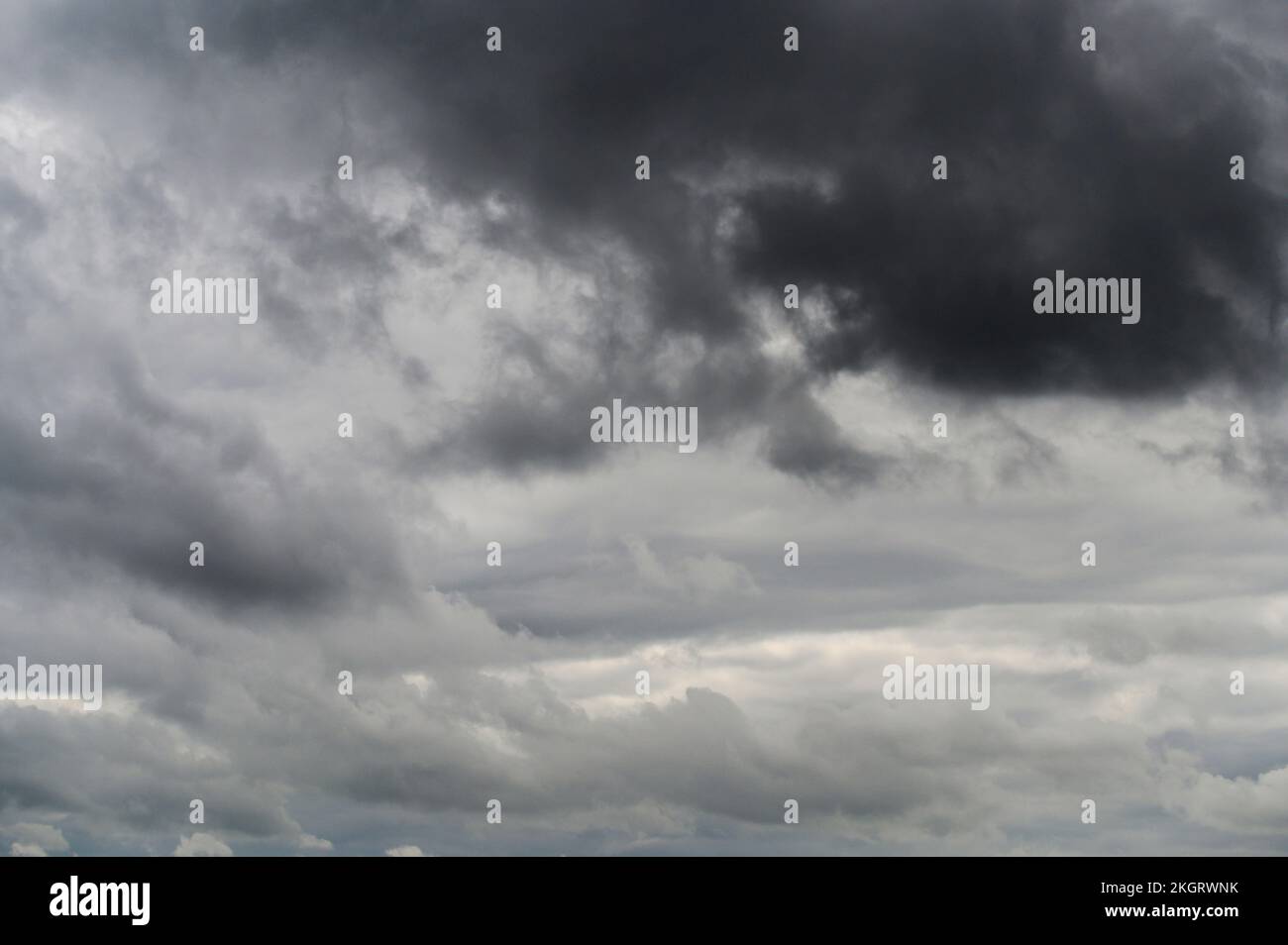 Dark clouds in a stormy sky. Stock Photo