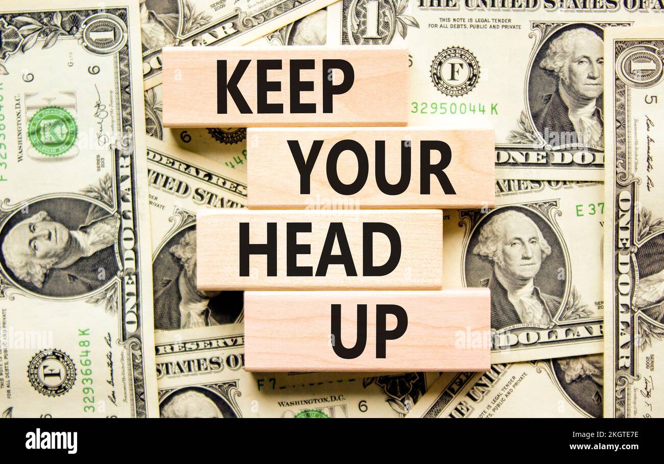 Keep your head up symbol. Concept words Keep your head up on wooden