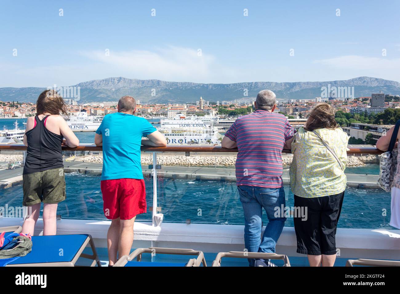 Passengers viewing city and port fom deck of Marella cruise ship, Split, Republic of Croatia Stock Photo