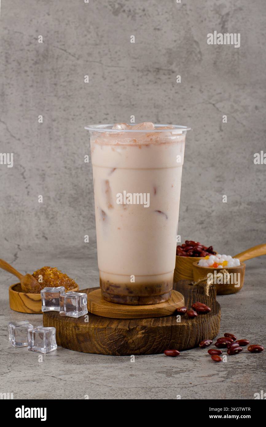 Boba or tapioca pearls is taiwan bubble milk tea in plastic cup with ...