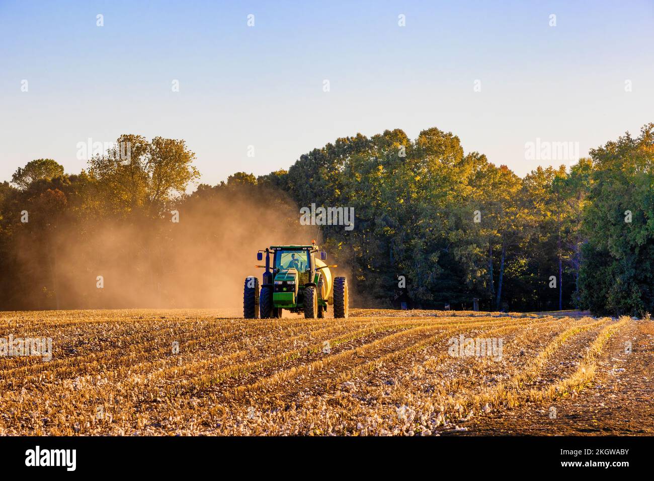 Rural Arkansas, USA October 1, 2022 A John Deere tractor picks up