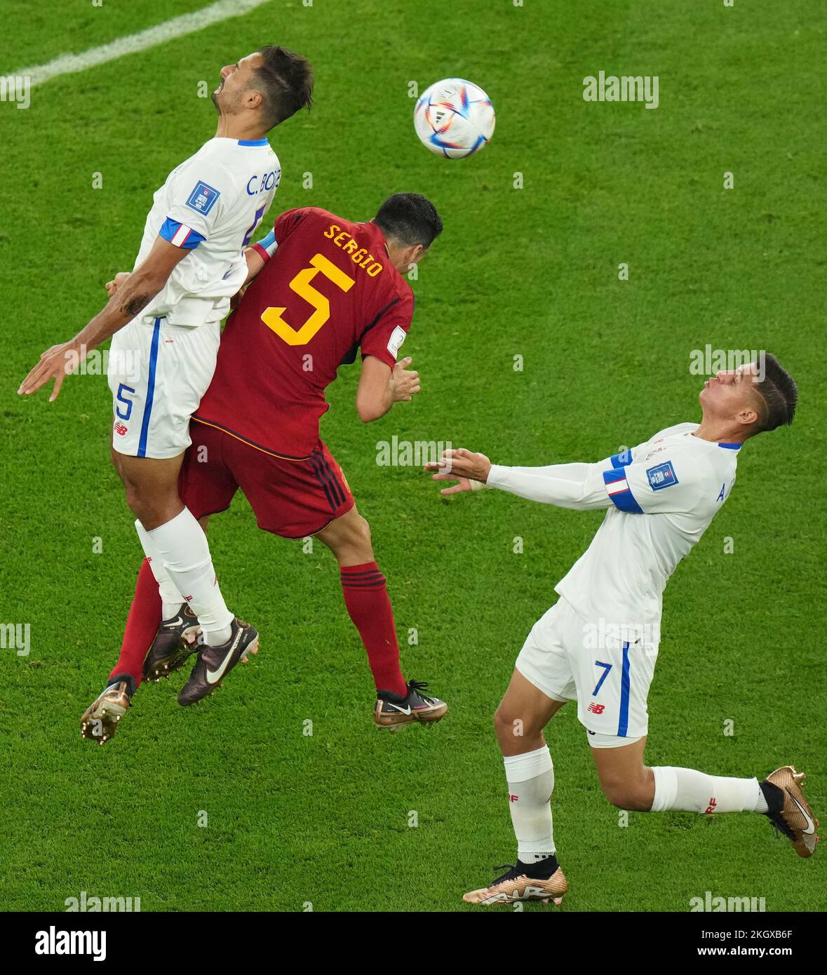 Costa Rica's Celso Borges and Anthony Contreras in action with Spain’s Sergio Busquets during the FIFA World Cup Group E match at the Al Thumama Stadium, Doha. Picture date: Wednesday November 23, 2022. Stock Photo