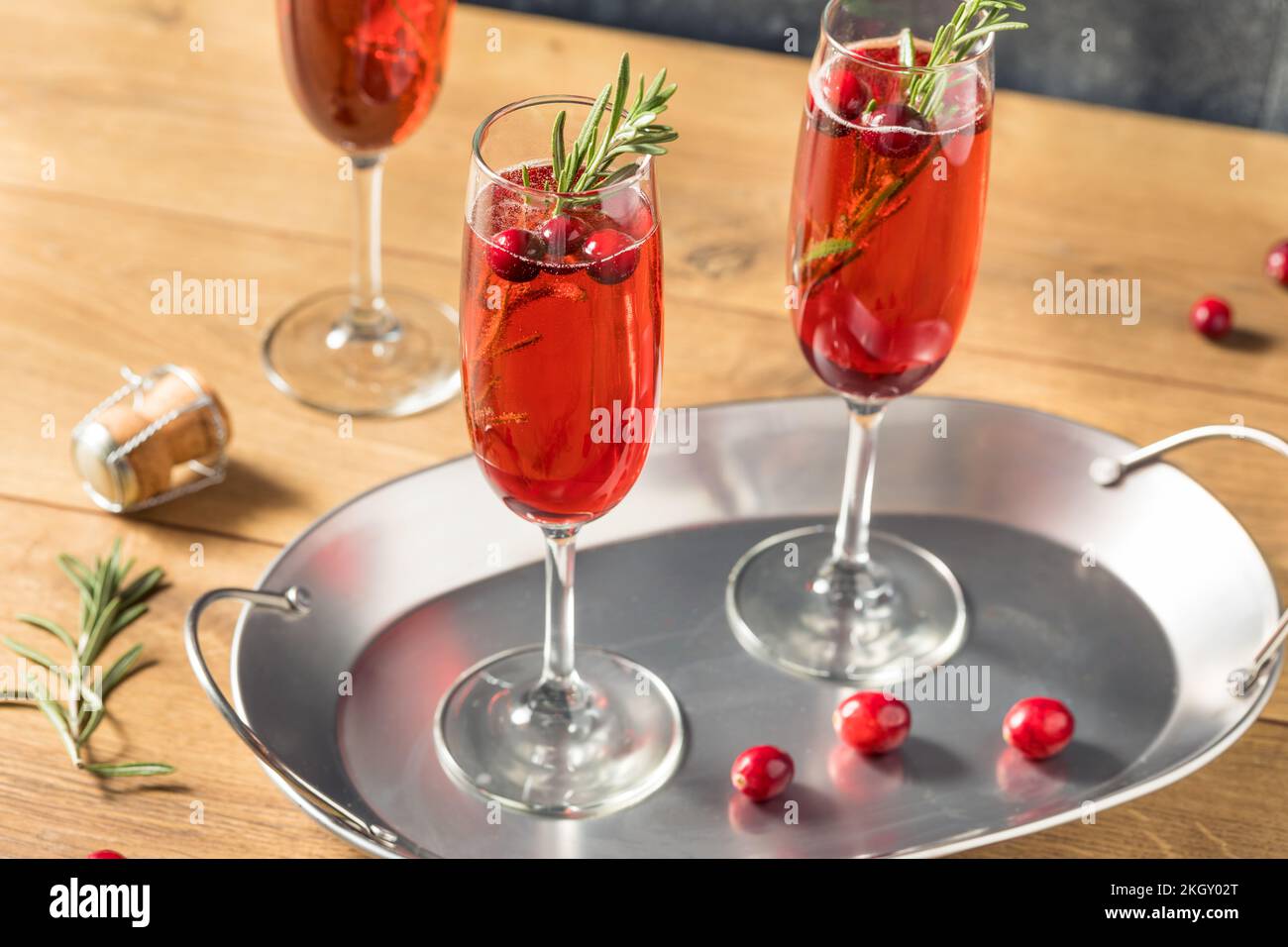 Boozy Refreshing Poinsettia Cranberry Champagne Cocktail for Christmas Stock Photo