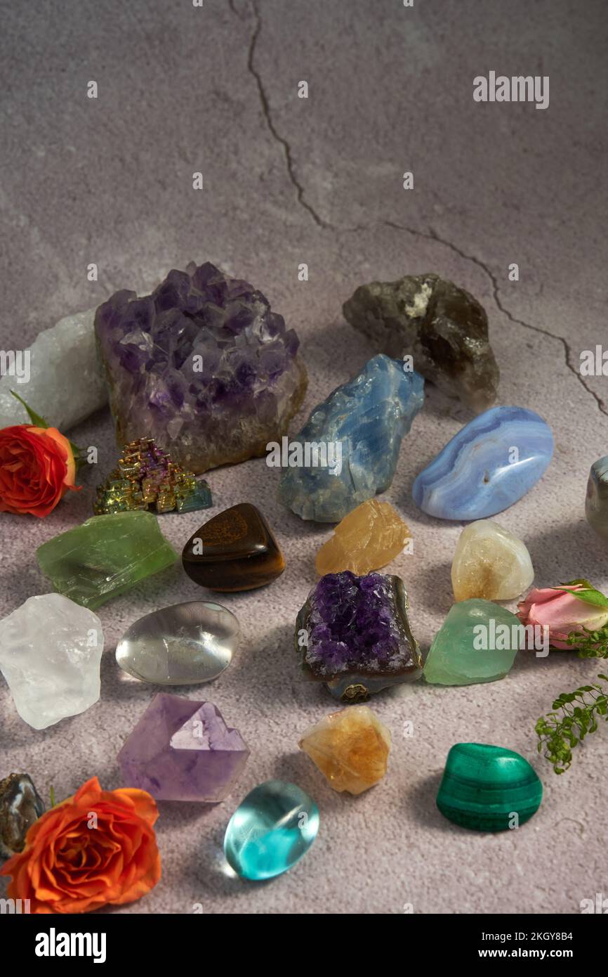 various gem stones on a gray background Stock Photo