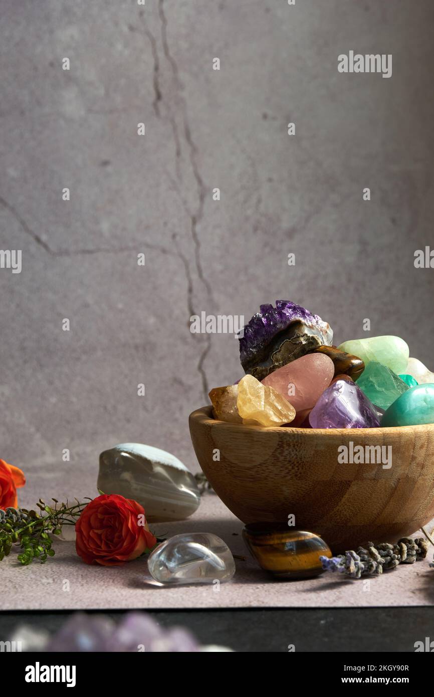 various gem stones in a wooden bowl Stock Photo Alamy