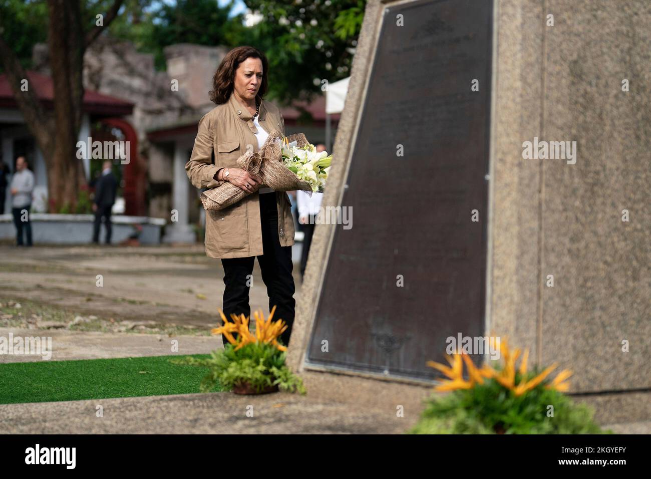 Puerto Princesa, Philippines. 22nd Nov, 2022. U.S. Vice President Kamala Harris places flowers at a memorial in honor of American prisons who lost their lives during the Japanese occupation at the Plaza Cuartel, November 22, 2022 in Puerto Princesa, Philippines. Plaza Cartel was a Japanese penal colony during World War Two where 143 American prisoners were burned alive in tunnels known as the Palawan Massacre. Credit: Lawrence Jackson/White House Photo/Alamy Live News Stock Photo