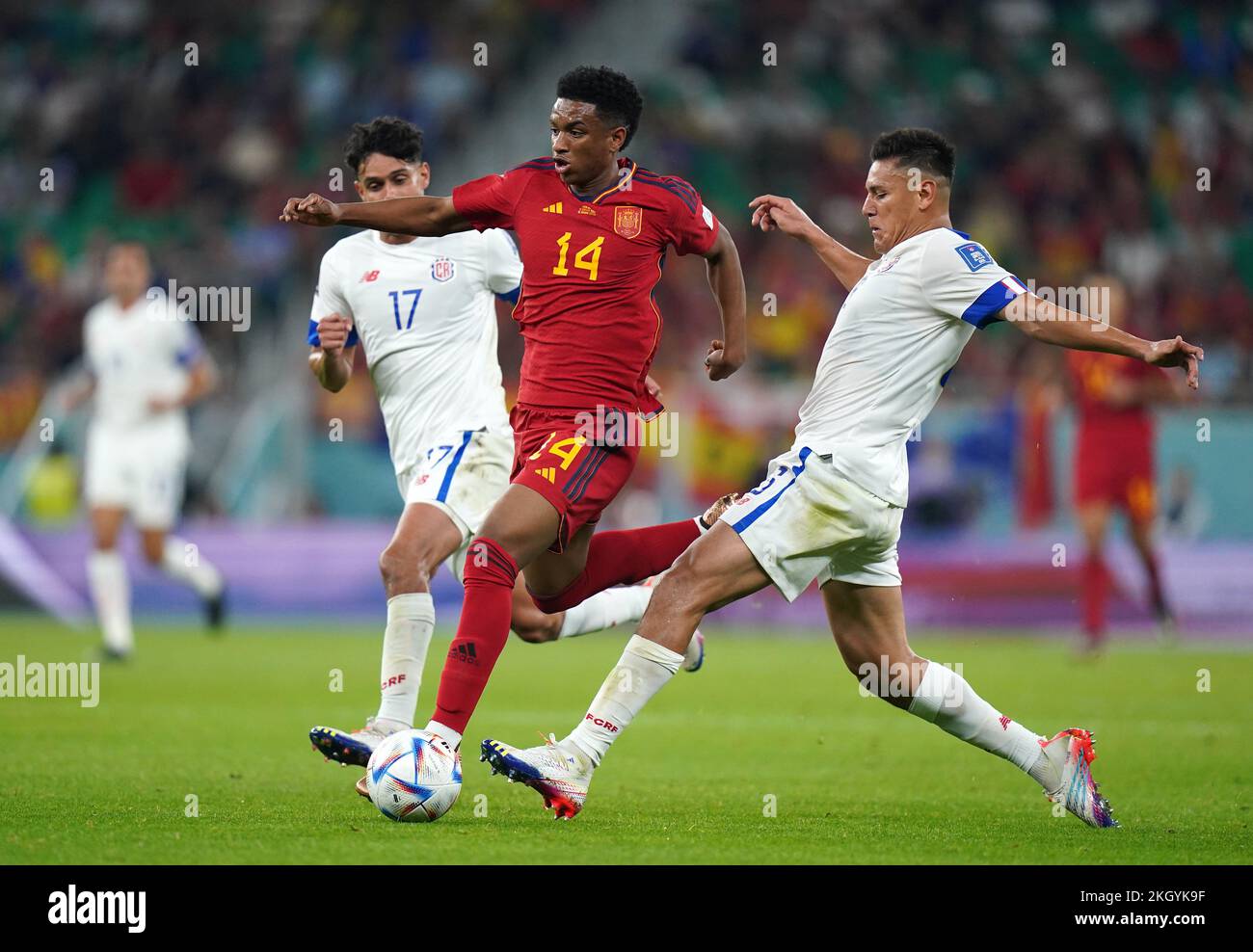 Costa Rica's Yeltsin Tejeda, Spain's Alejandro Balde and Costa Rica's Oscar Duarte (left-right) battle for the ball during the FIFA World Cup Group E match at the Al Thumama Stadium, Doha. Picture date: Wednesday November 23, 2022. Stock Photo