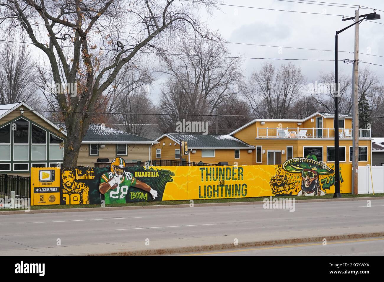 A home on Lombardi Ave with Green Bay Packers signage across the street