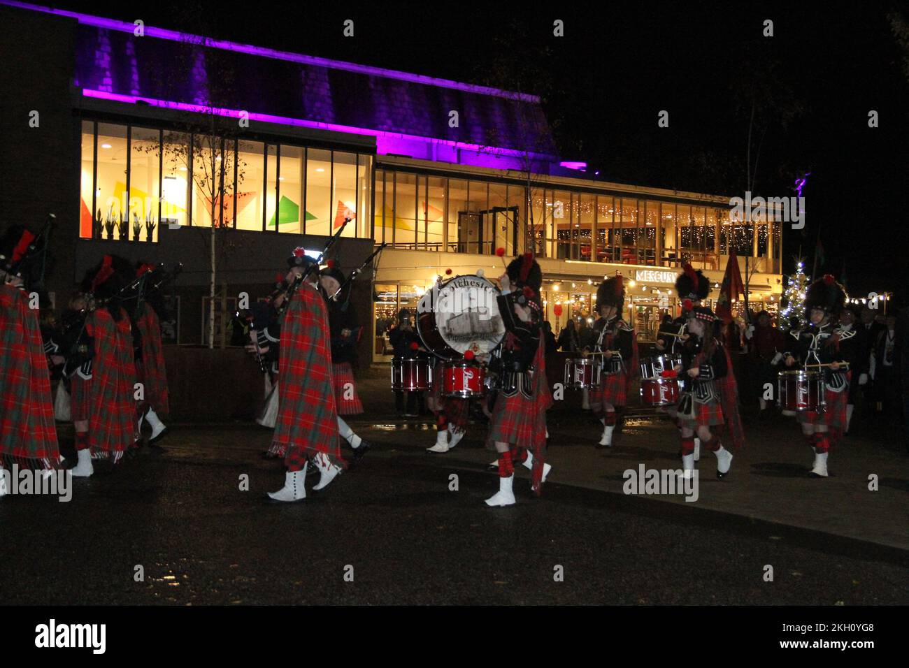 Colchester, UK. 23rd Nov 2022. Colchester, Britain's oldest recorded town, has officially become a city this evening after the letters patent were presented to the Mayor, Cllr Tim Young. A procession ahead of the ceremony left the Mercury Theatre and arrived at the Town Hall led by the Colchester Pipes and Drums band. Credit: Eastern Views/Alamy Live News Stock Photo