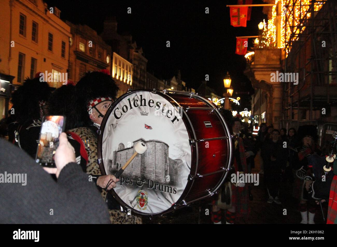 Colchester, UK. 23rd Nov 2022. Colchester, Britain's oldest recorded town, has officially become a city this evening after the letters patent were presented to the Mayor, Cllr Tim Young. A procession ahead of the ceremony left the Mercury Theatre and arrived at the Town Hall led by the Colchester Pipes and Drums band. Credit: Eastern Views/Alamy Live News Stock Photo