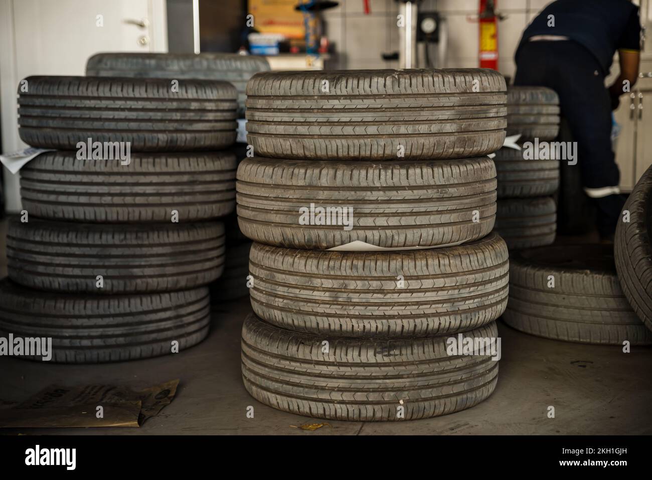 Tire installation concept. Winter and summer car tires. Seasonal winter