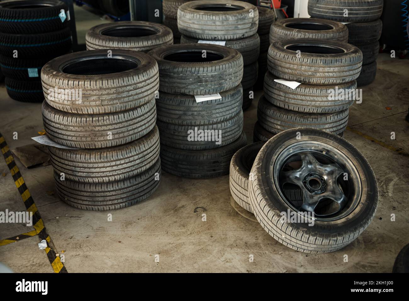 Tire installation concept. Winter and summer car tires. Seasonal winter