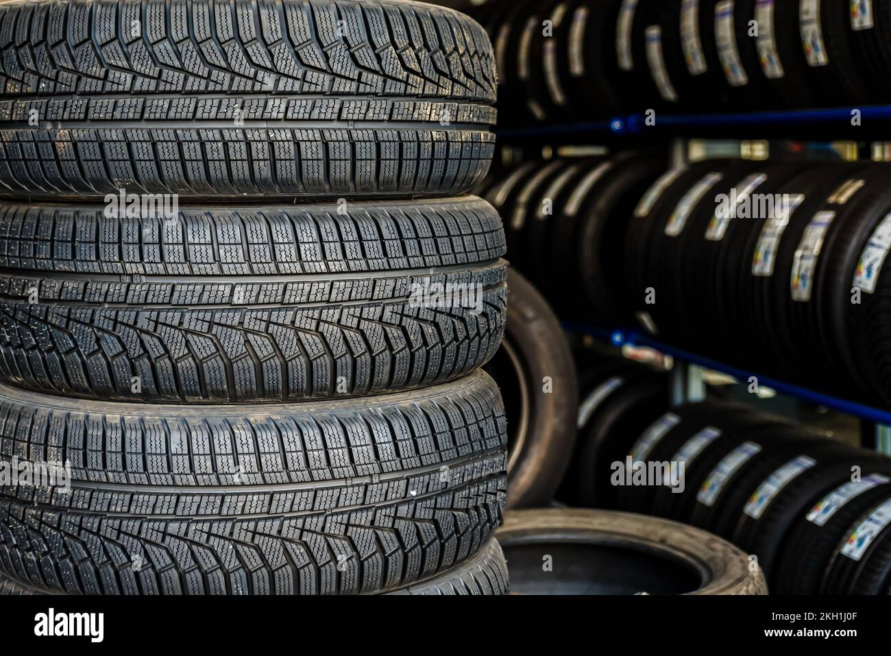 Tire installation concept. Winter and summer car tires. Seasonal winter