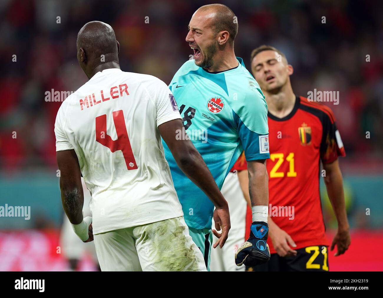 Canada goalkeeper Milan Borjan celebrates with Kamal Miller after making a tackle during the FIFA World Cup Group F match at the Ahmad bin Ali Stadium, Al Rayyan. Picture date: Wednesday November 23, 2022. Stock Photo