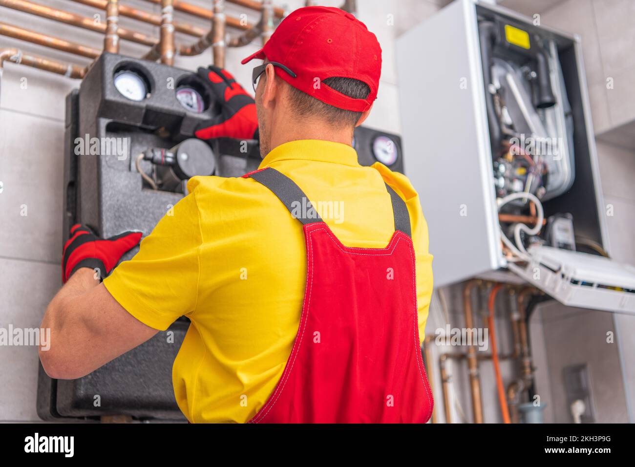 Professional Plumber Performing Scheduled Water Heating Installation