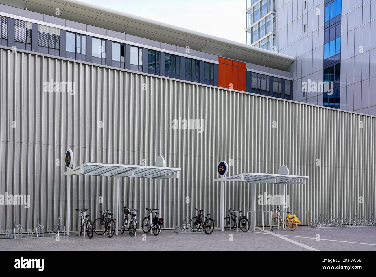 Bicycle racks at the Konrad Adenauer building on rue Alcide De Gasperi in the European Quarter (Luxembourg) on the Kirchberg Plateau. Stock Photo