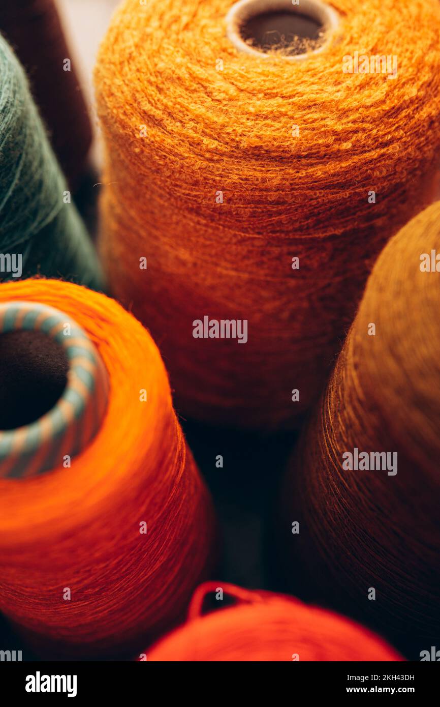 Composition of colorful vibrant wool threads from above. Autumn colours ...