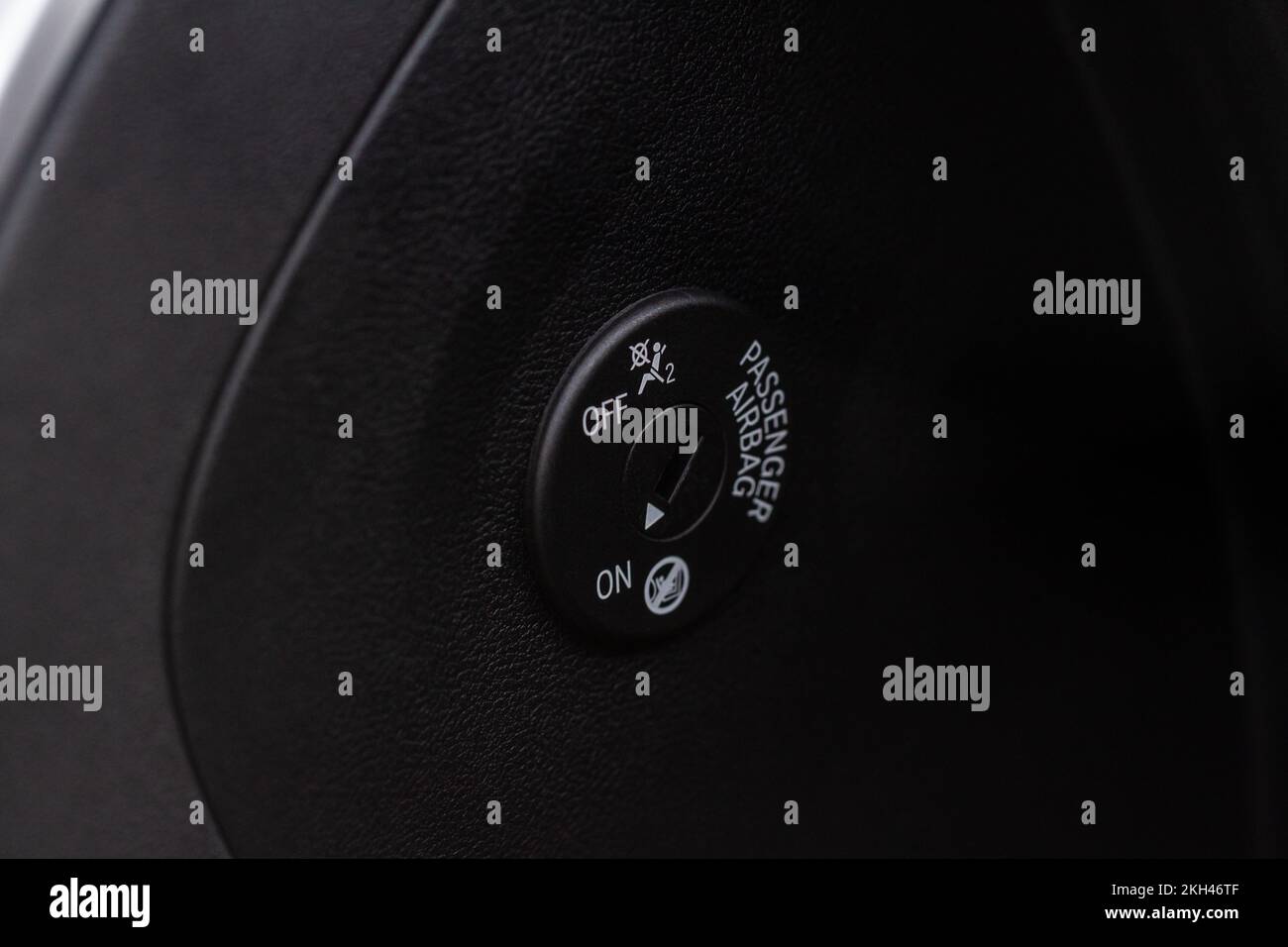 Front passenger airbag on and off switch close up view. Passenger