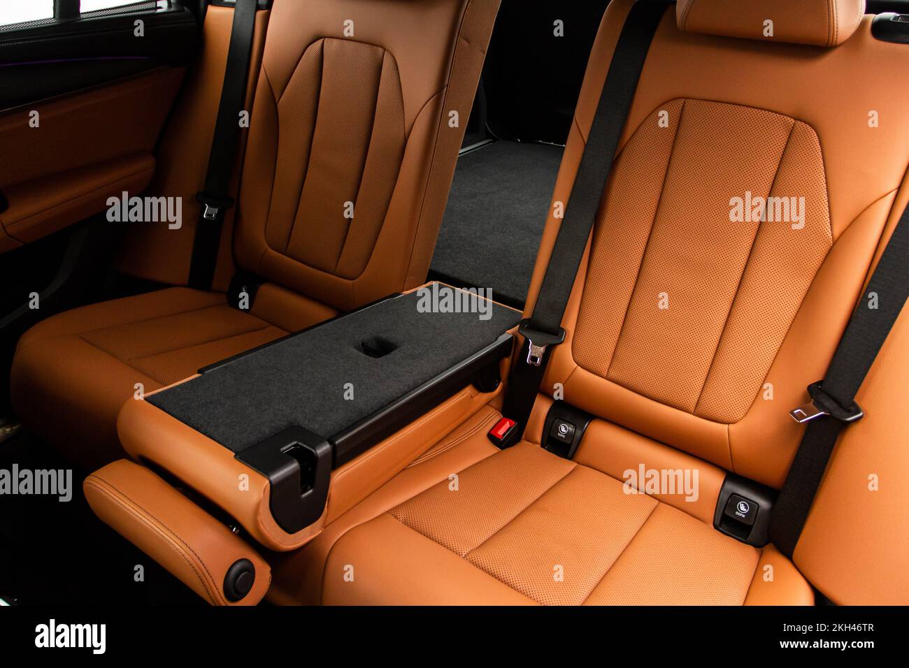 Folding seats and a cargo space inside suv car. Modern car interior