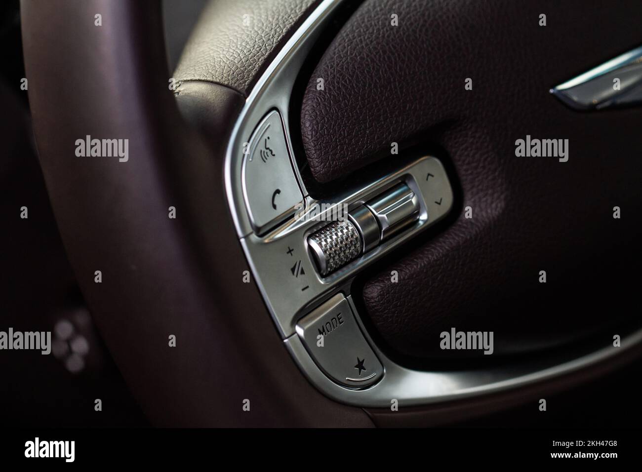 Call buttons on car steering wheel. Audio control buttons on the