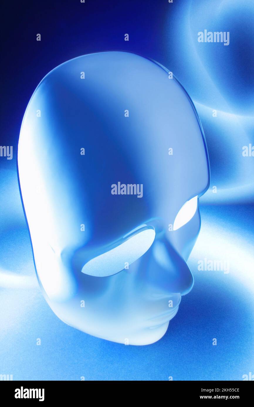 Face Mask on Blue Background Stock Photo