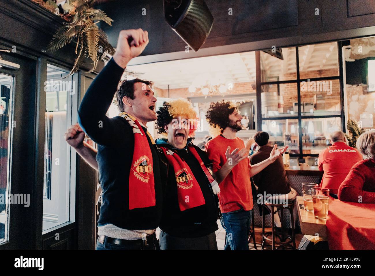 Belgian soccer fans gather to watch a 2022 FIFA World Cup soccer game between Belgium and Canada, at The Lamplighter Public House in Vancouver, British Columbia, Canada on Wednesday 23 November 2022. The World Cup takes place in the State of Qatar from 20 November to 18 December. BELGA PHOTO SISKA GREMMELPREZ Stock Photo