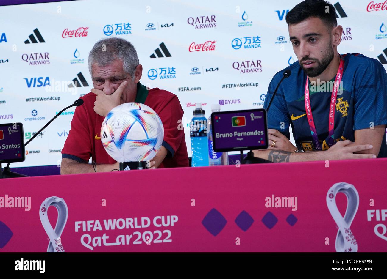 Doha, Qatar. 23rd Nov, 2022. Portugal's head coach Fernando Santos (L) and player Bruno Fernandes attend a press conference one day ahead of the group H match between Portugal and Ghana at the 2022 Qatar FIFA World Cup in Doha, Qatar, Nov. 23, 2022. Credit: Li Gang/Xinhua/Alamy Live News Stock Photo
