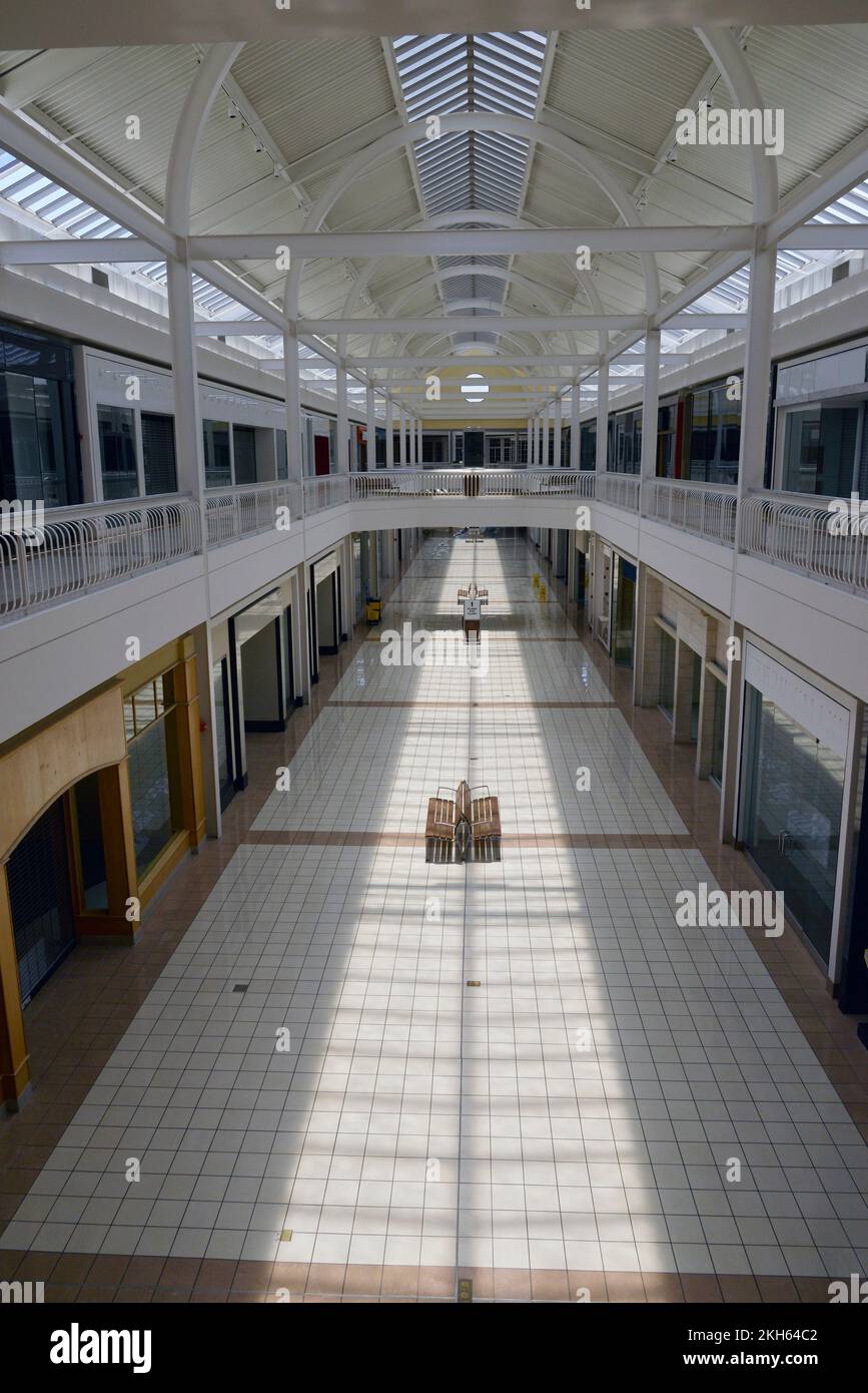 Large Shopping Center completely empty prior to closing and demolition. Stock Photo