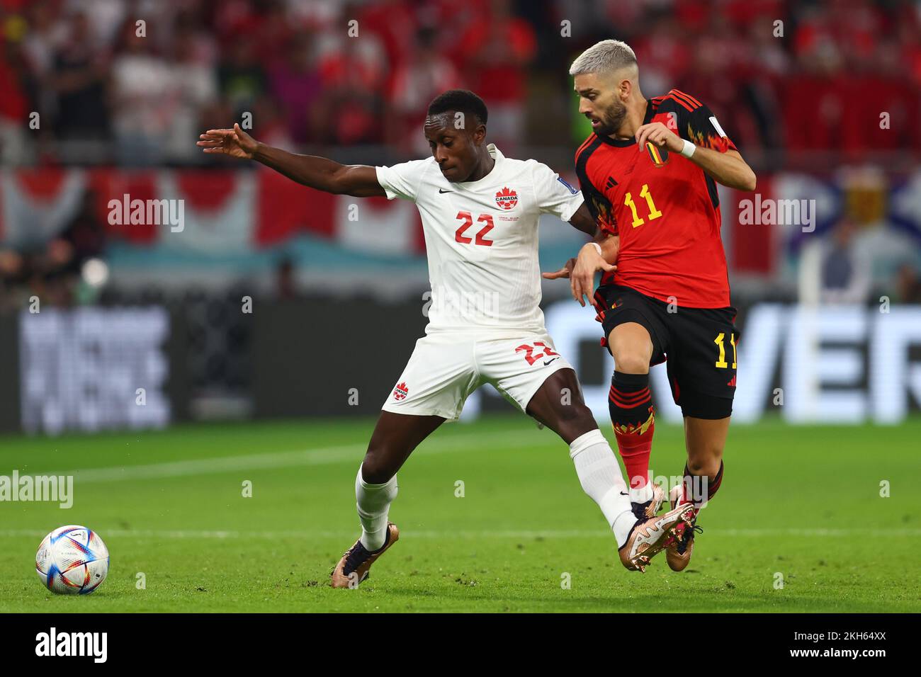 Doha, Qatar. 23rd Nov, 2022. Yannick Carrasco (R) of Belgium in action with Richie Laryea of Canada during the 2022 FIFA World Cup Group F match at the Ahmad Bin Ali Stadium in Doha, Qatar on November 23, 2022. Photo by Chris Brunskill/UPI Credit: UPI/Alamy Live News Stock Photo