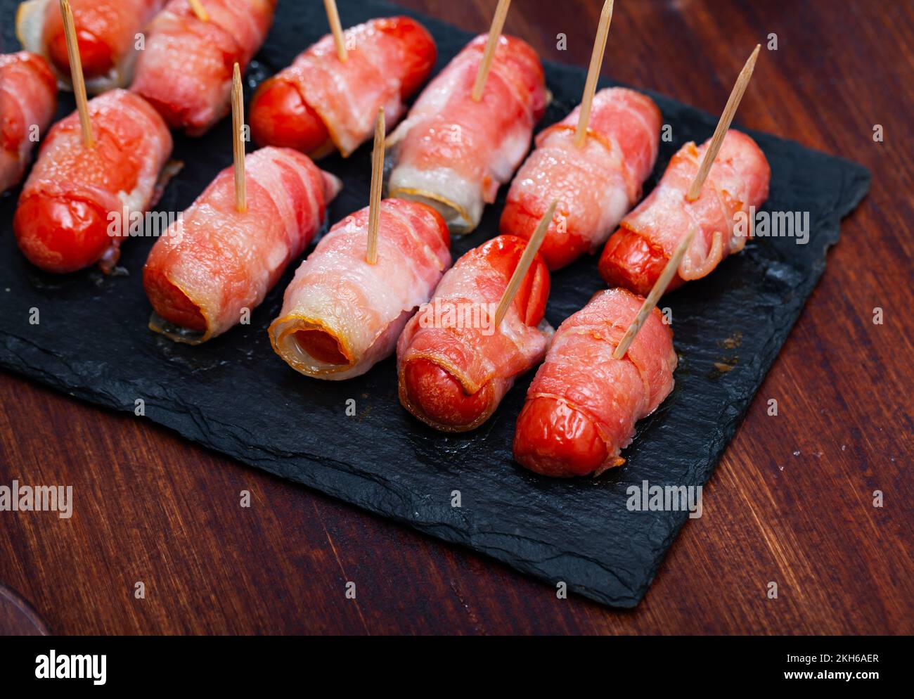 Bacon wrapped cocktail wieners Stock Photo Alamy