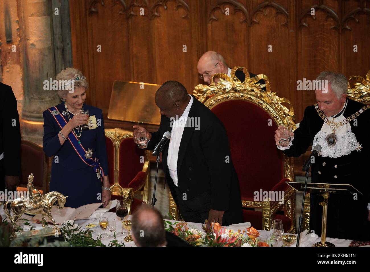 President Cyril Ramaphosa of South Africa, raises a toast to the Duchess of Gloucester and the Lord Mayor of London, Nicholas Lyons (right) during a banquet at the Guildhall in London, given by the Lord Mayor and City of London Corporation, during his state visit to the UK. Picture date: Wednesday November 23, 2022. Stock Photo