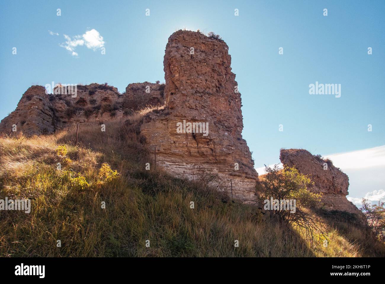 Visibly from afar: the castle hill of Belorado with its ruins of the medieval castle dominates the town at the former border between the historic kingdoms of Castile and Navarra Stock Photo