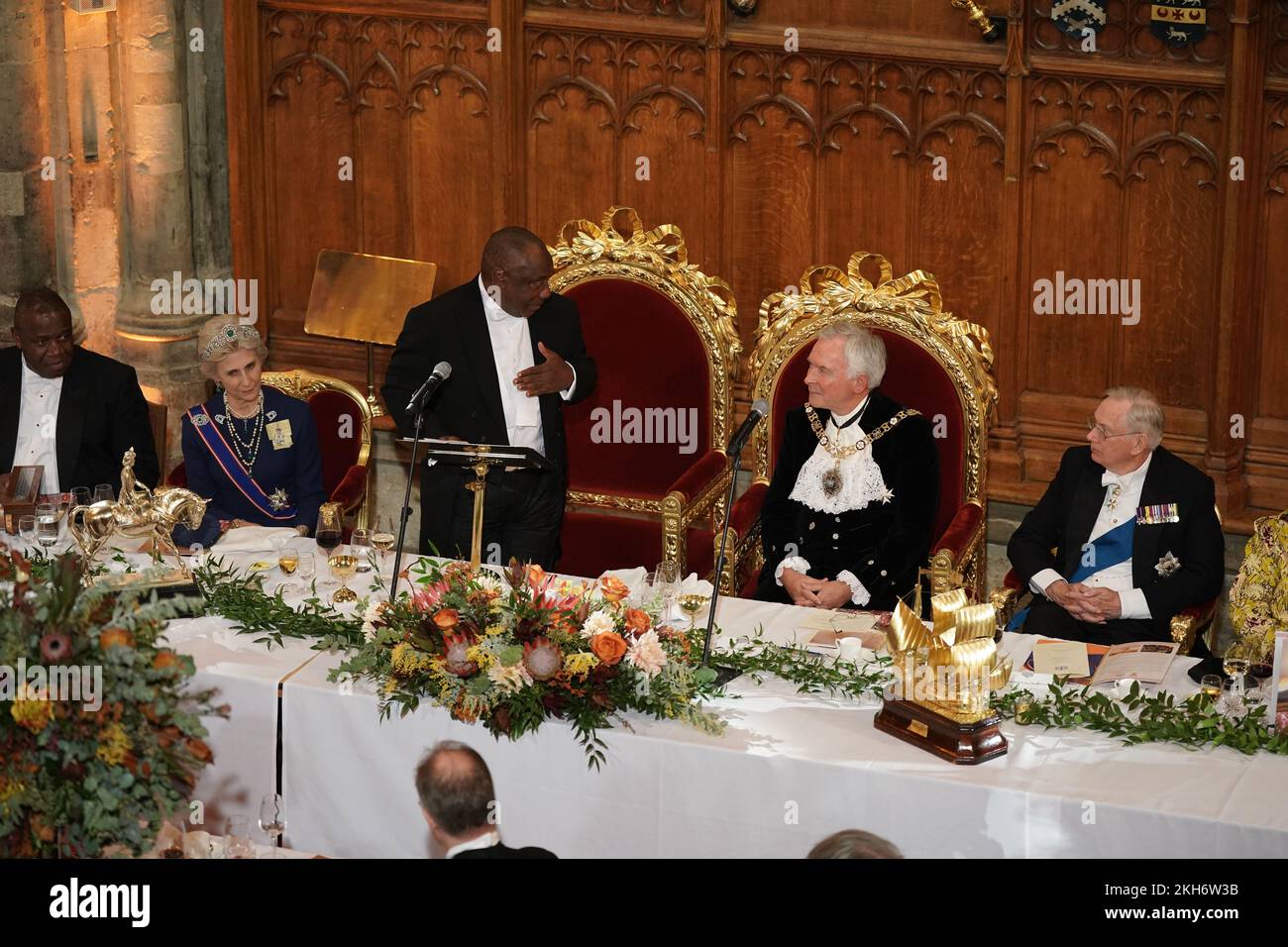 President Cyril Ramaphosa of South Africa speaks as the Lord Mayor of London, Nicholas Lyons, (second right) the Duke (right) and Duchess of Gloucester (second left) listen, during a banquet at the Guildhall in London, given by the Lord Mayor and City of London Corporation, during his state visit to the UK. Picture date: Wednesday November 23, 2022. Stock Photo