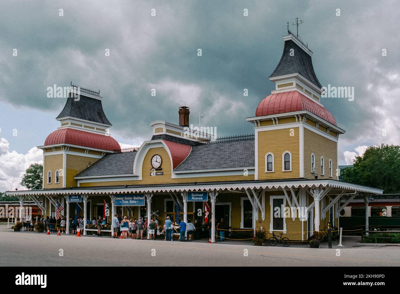 The Conway Scenic Railway station with a dramatic sky with visitors