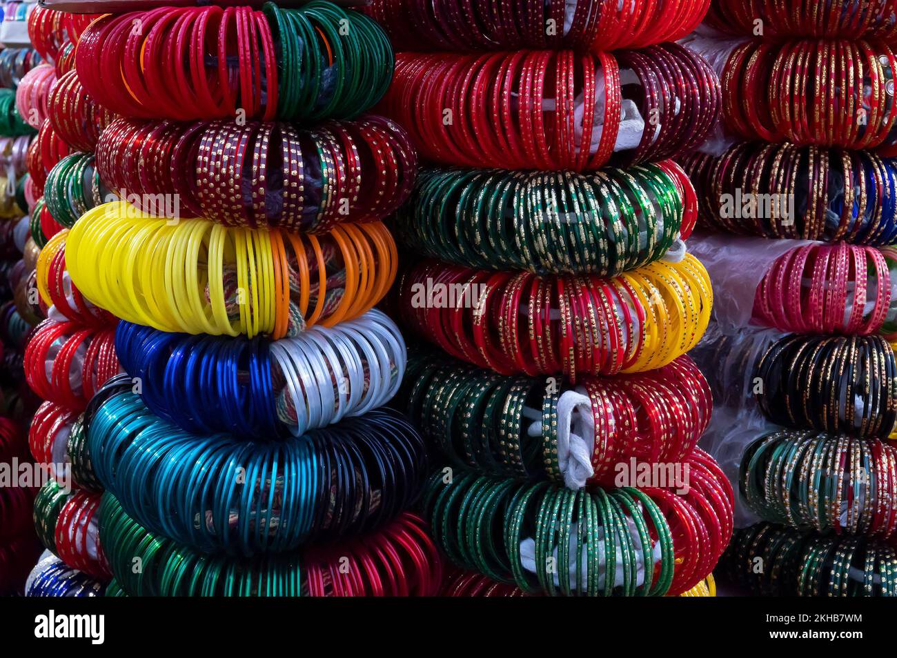 Colorful Rajasthani bangles being sold at famous Sardar Market and Ghanta ghar Clock tower in Jodhpur, Rajasthan, India. Stock Photo