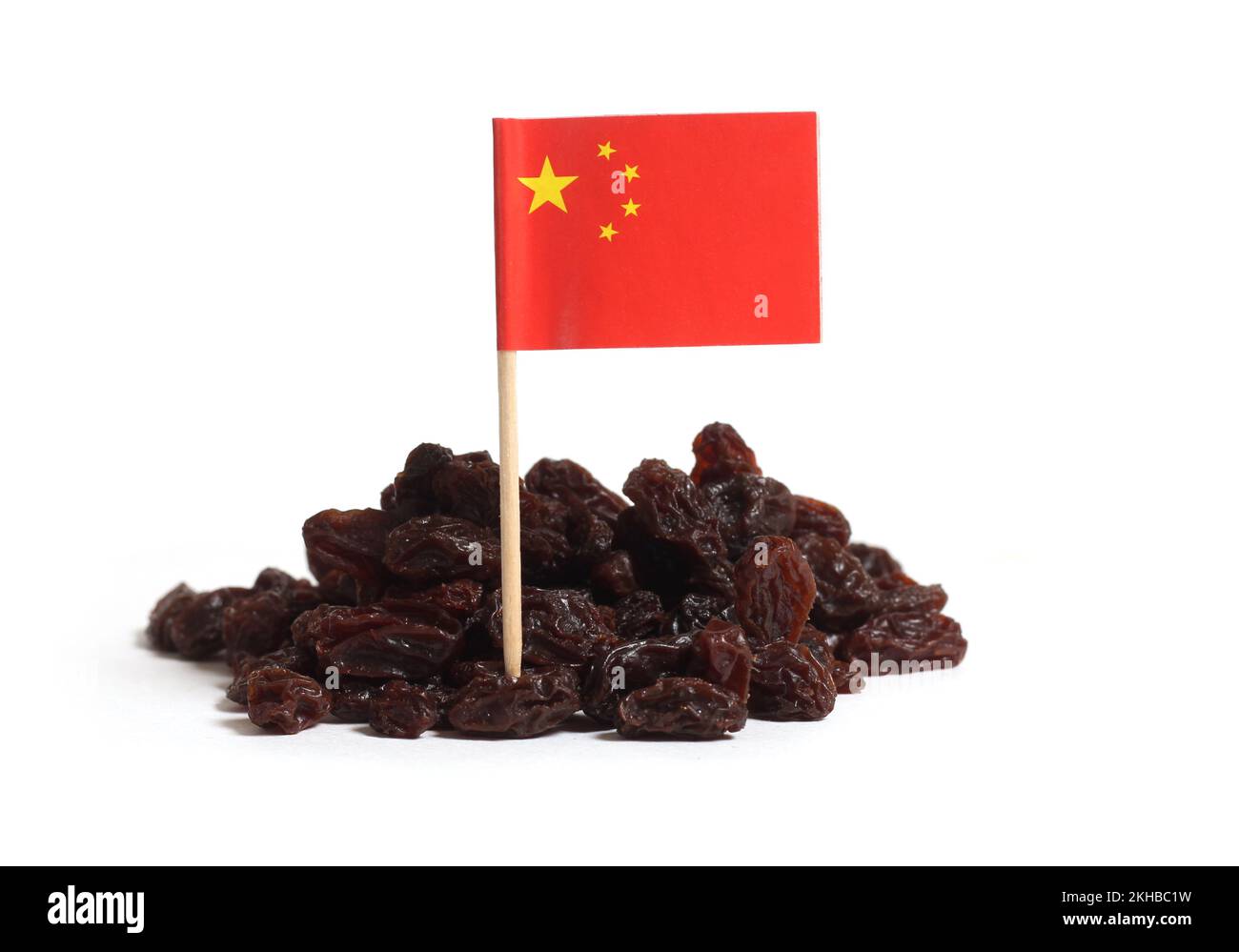 Pile of Raisins With Flag of China Isolated on White Background Stock Photo