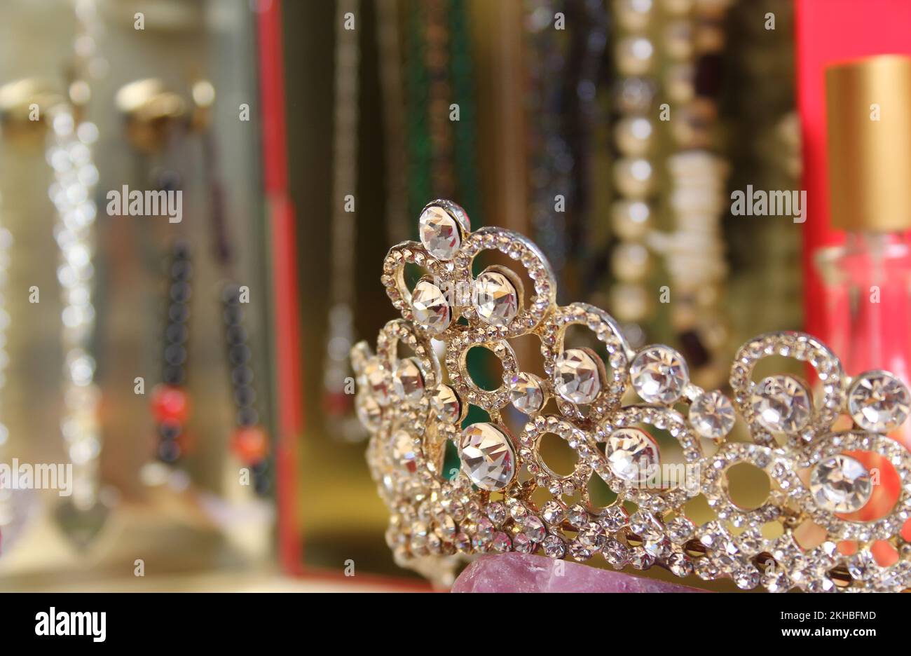 Crystal Tiara on Dressing Table Close up with Jewelry in Background, Shallow DOF Stock Photo