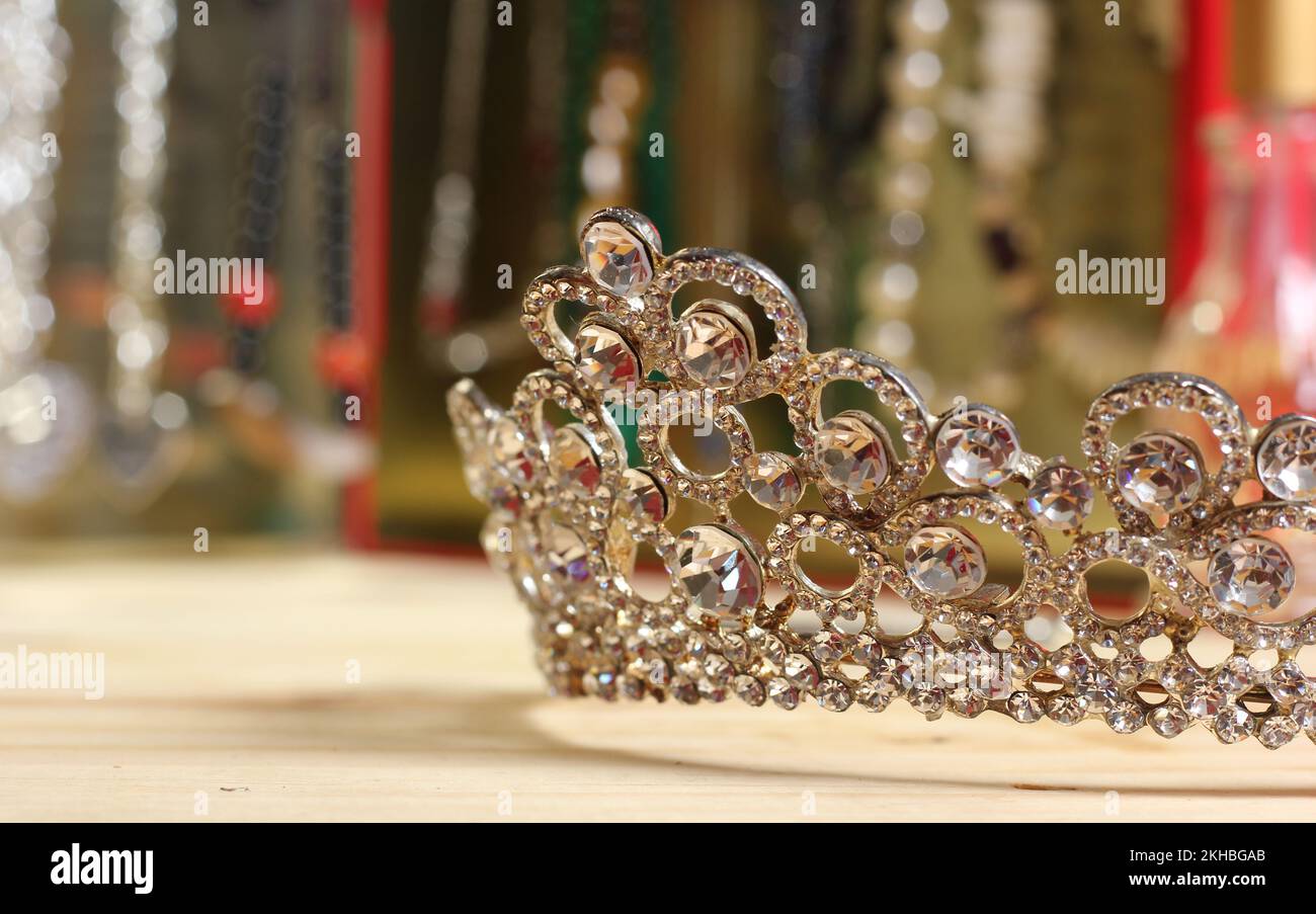 Crystal Tiara on Dressing Table Close up with Jewelry in Background, Shallow DOF Stock Photo