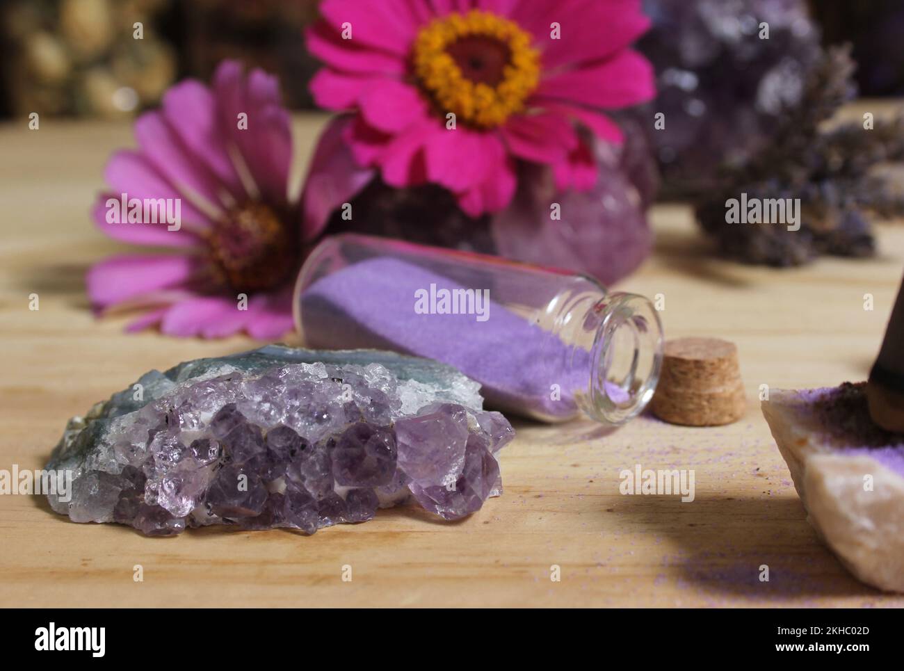 Amethyst Crystals With Flowers and Incense Cones on Meditation Altar Stock Photo