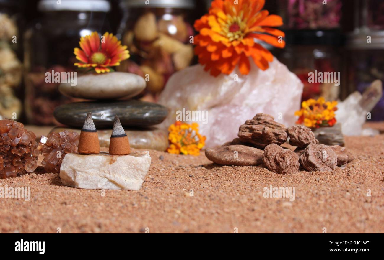 Chakra Stones on Australian Red Sand With Agatized Coral in Background Shallow DOF Stock Photo